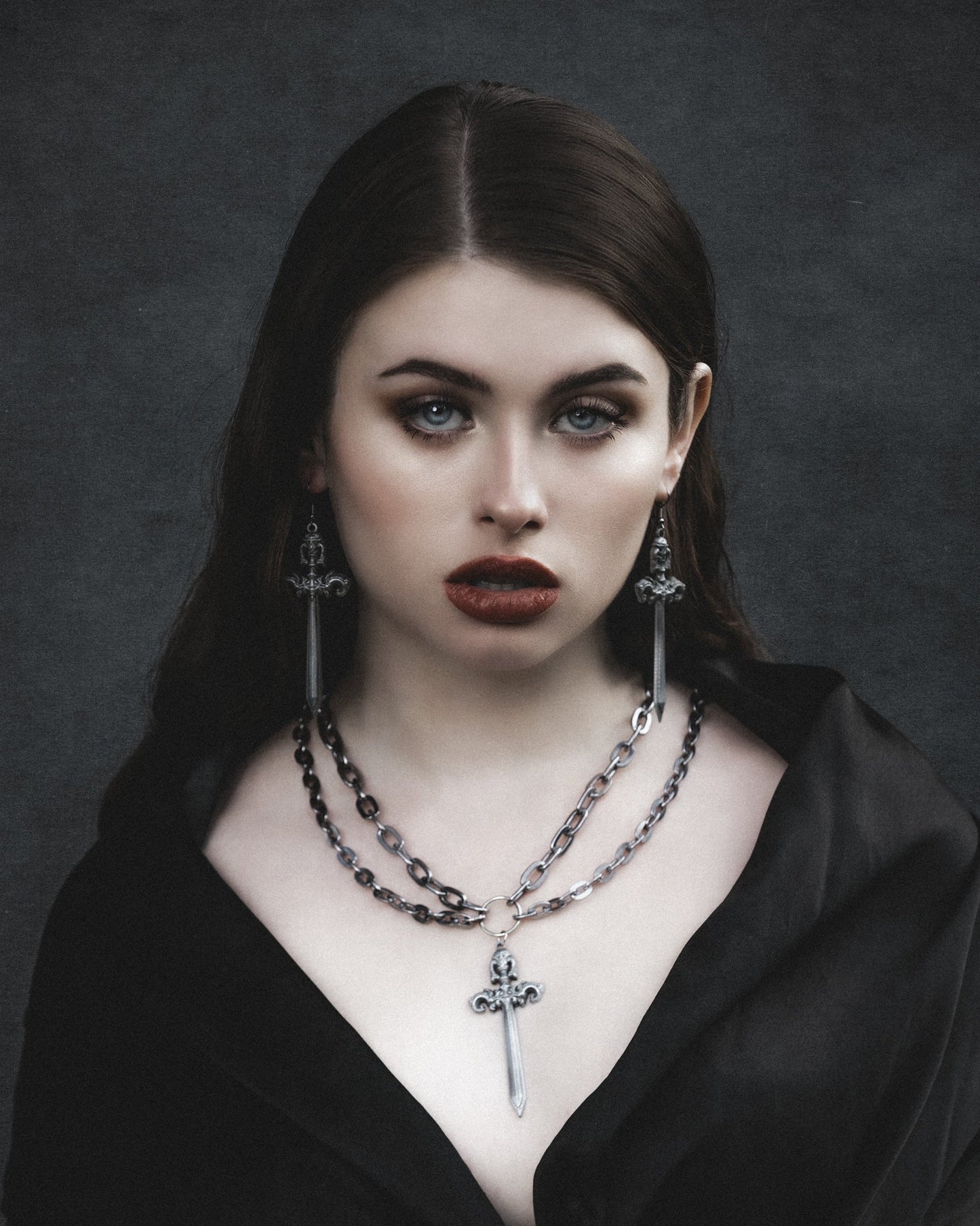 Woe Blade silver layered necklace styled on model