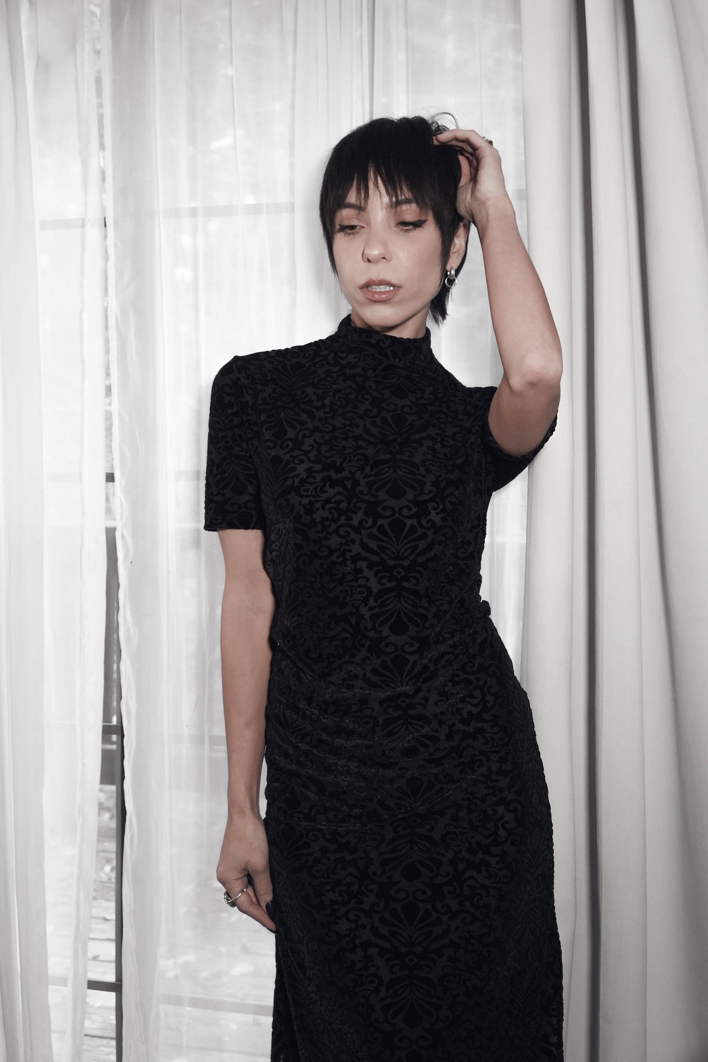 Dark Solstice dress in black vegan velvet, close-up of the drape
