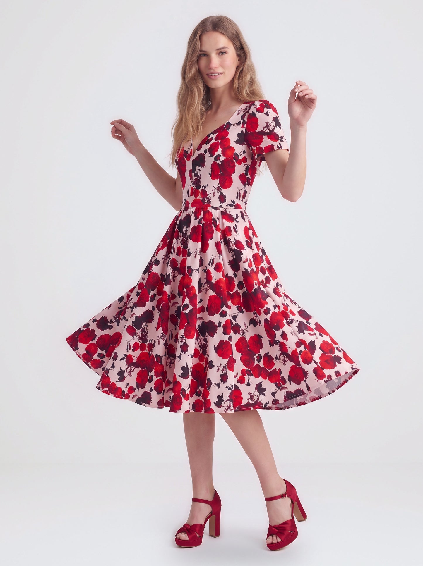 Lilith swing dress in Fiori Dolce, a red and white floral, with eyelash lace and a full skirt, by Pinup Girl Clothing