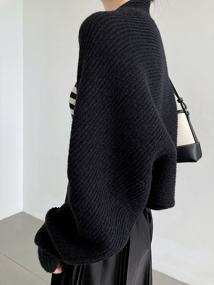 Bellatrix Knitted Acrylic Shrug Sweater in Solid Black | Marigold Shadows