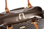 Starz Art retro crystal-studded vegan leather overnight bag with a latch closure and detachable strap, from Pinup Girl Clothing