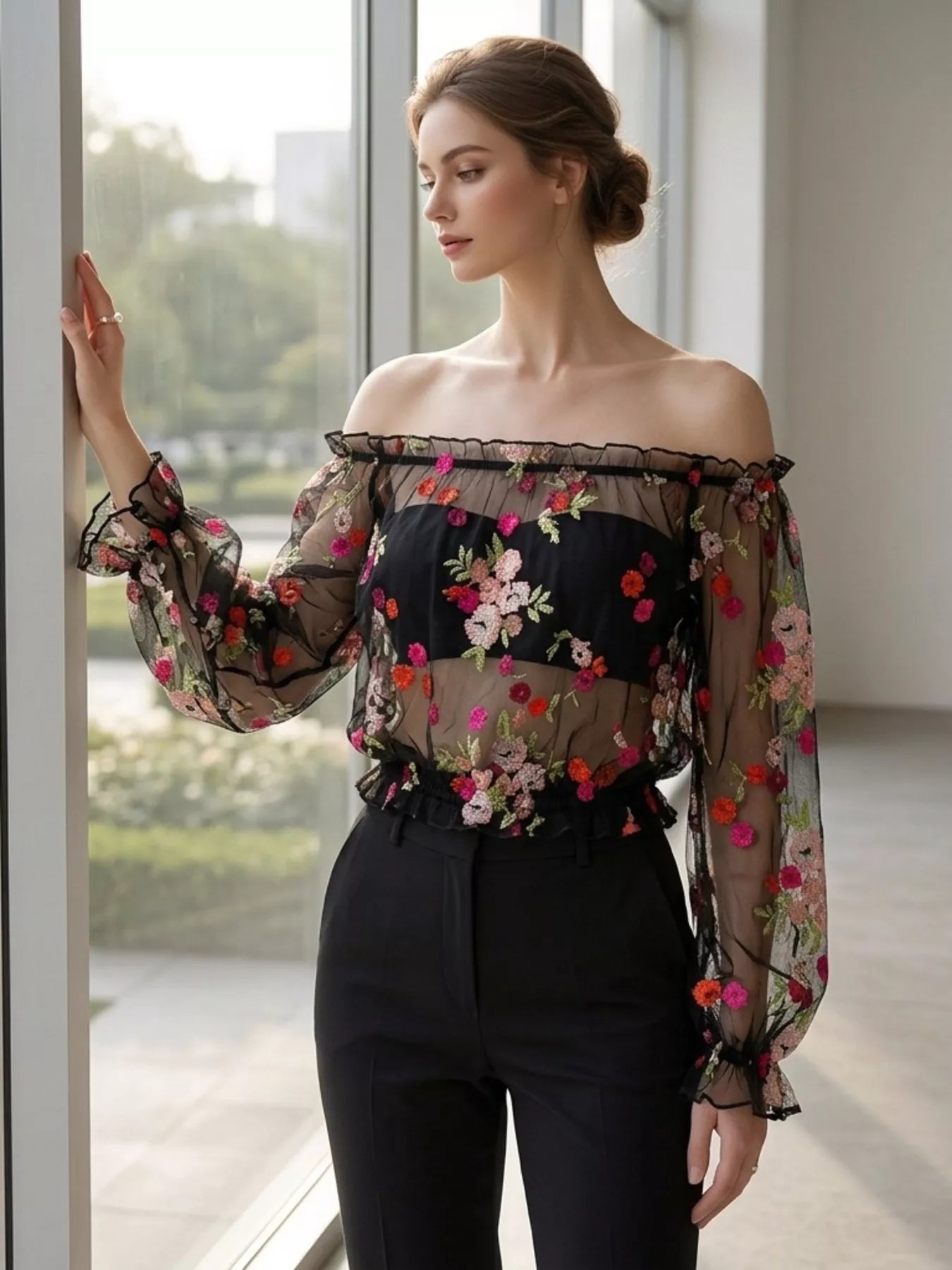 Floral embroidered mesh off-shoulder top in black by Pinup Girl Clothing.