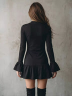 Ravenna bell sleeve ruffle hem mini dress in black back view