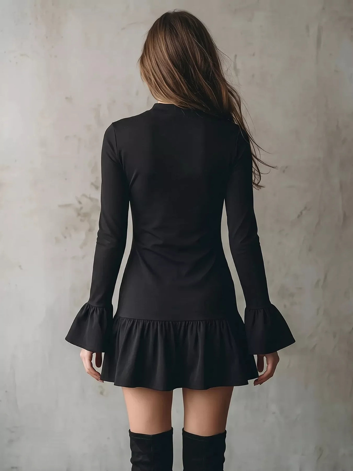 Ravenna bell sleeve ruffle hem mini dress in black back view