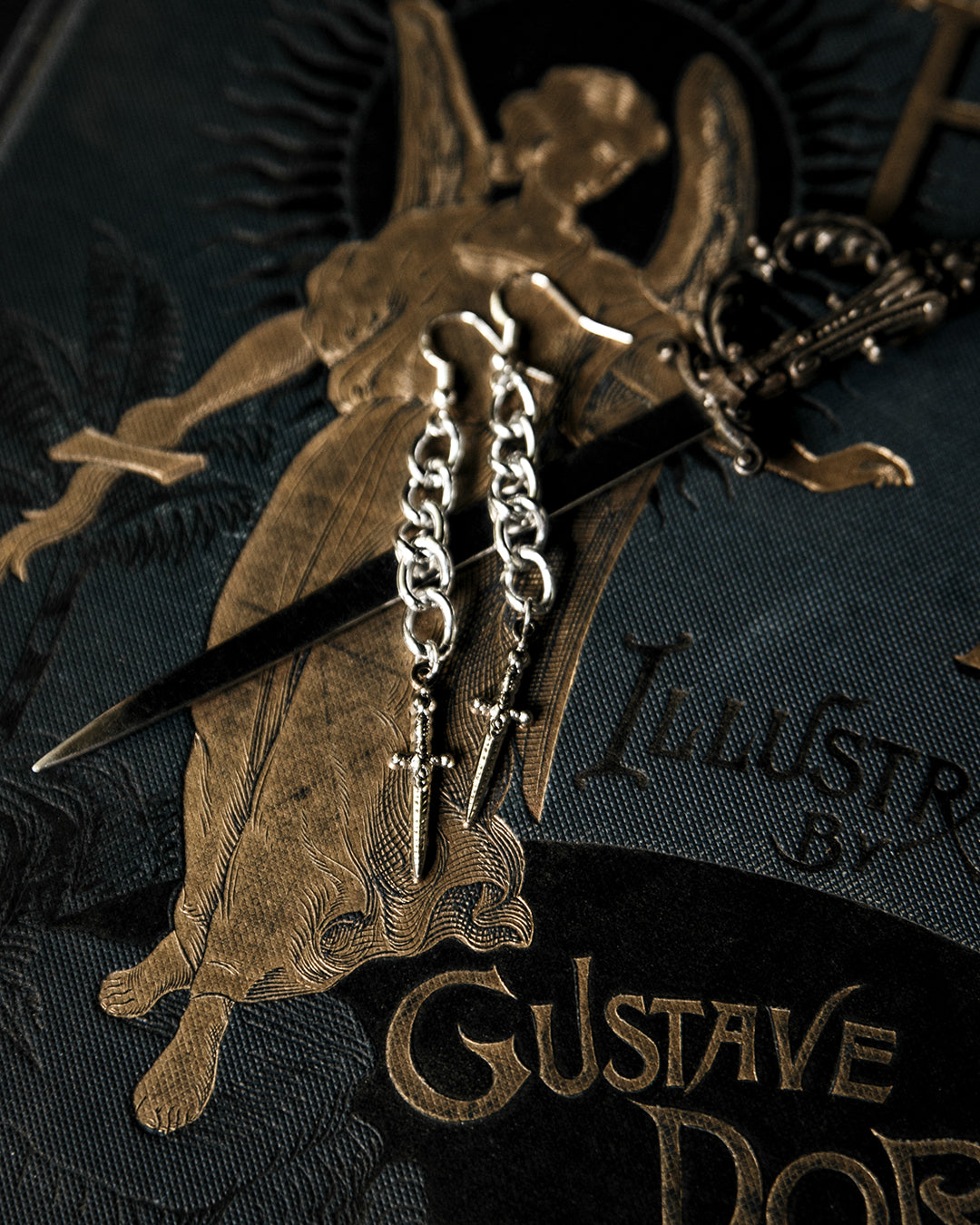 Silver athame dagger drop earrings on curb chain, by The Pretty Cult