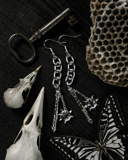 Flail silver drop earrings styled by candlelight, The Pretty Cult