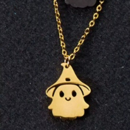 Scale view of the gold ghost pendant necklace