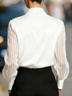 The Scarlet Siren sheer-sleeve collared blouse by Pinup Girl Clothing, sizes XS to 4X.