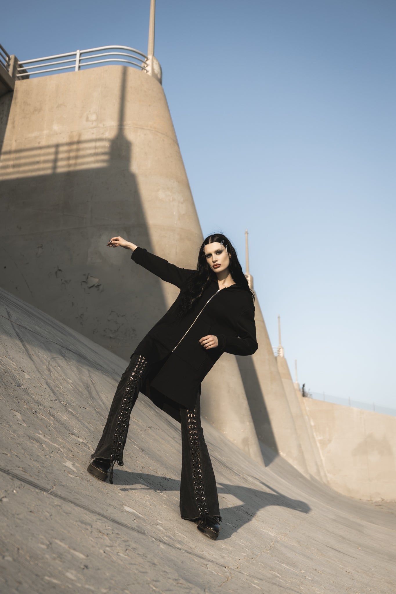Van Helsing longline hoodie in black cotton terry, side view