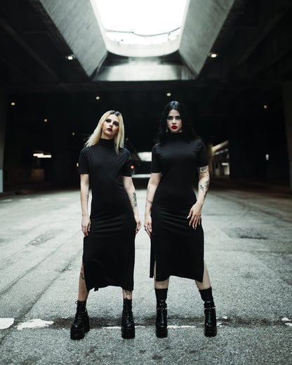 Black midi dress with a mid neckline and side slits by The Pretty Cult