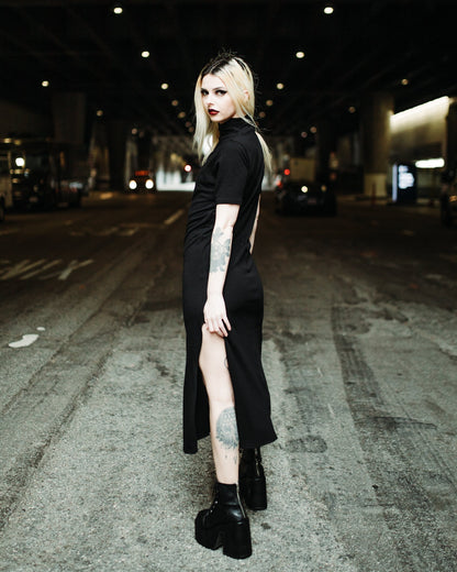 Black Seer midi dress styled with a harness