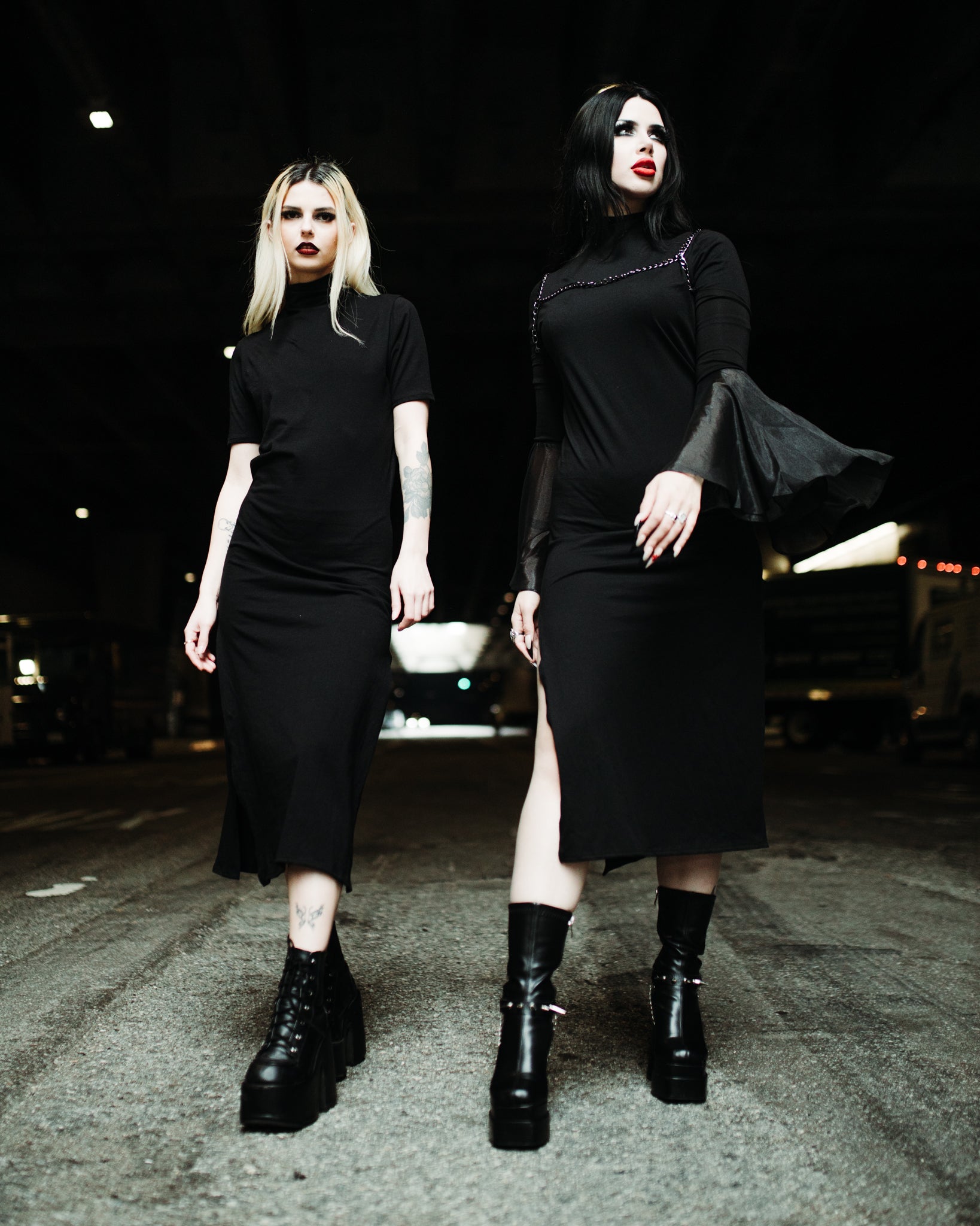 Short sleeve black midi dress with a mid neckline