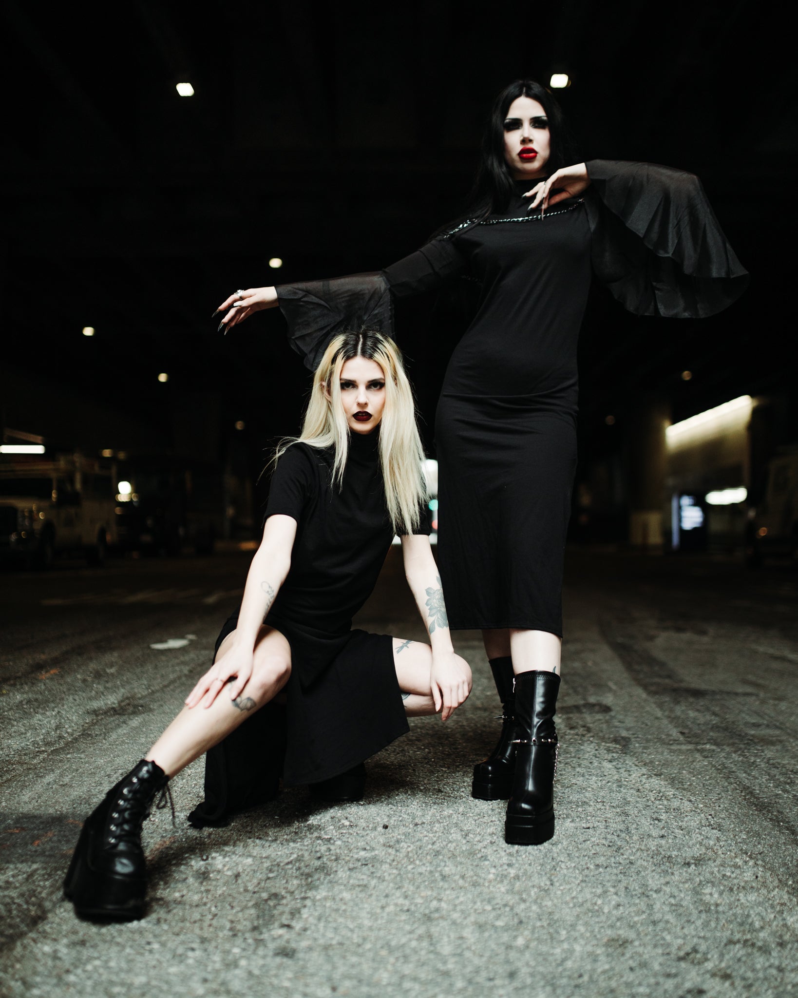 Full length view of the black Seer midi dress