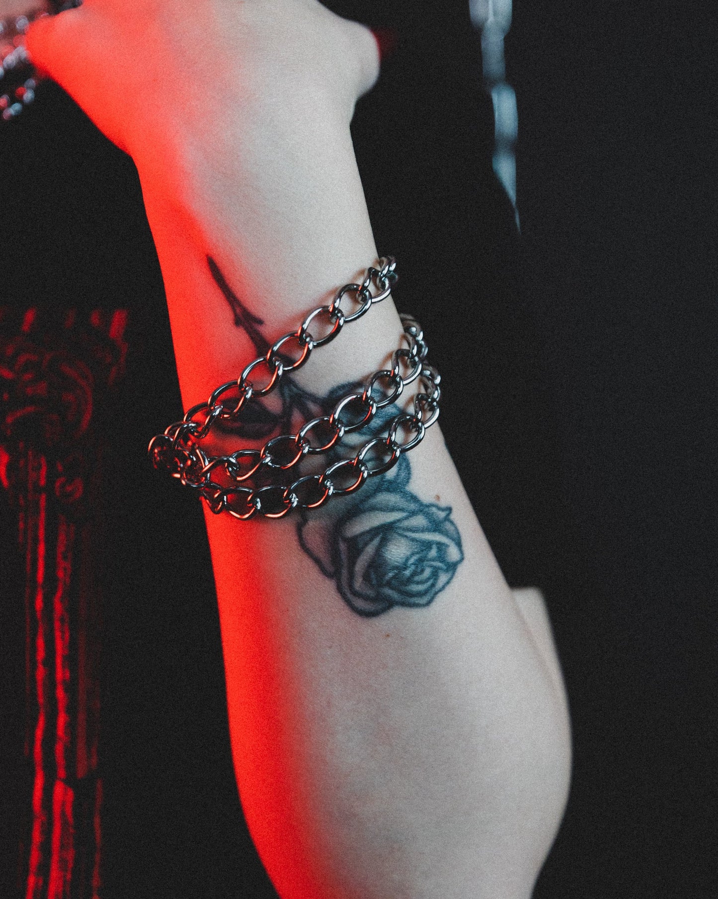 Model wearing the Evil Things silver three tier chain bracelet