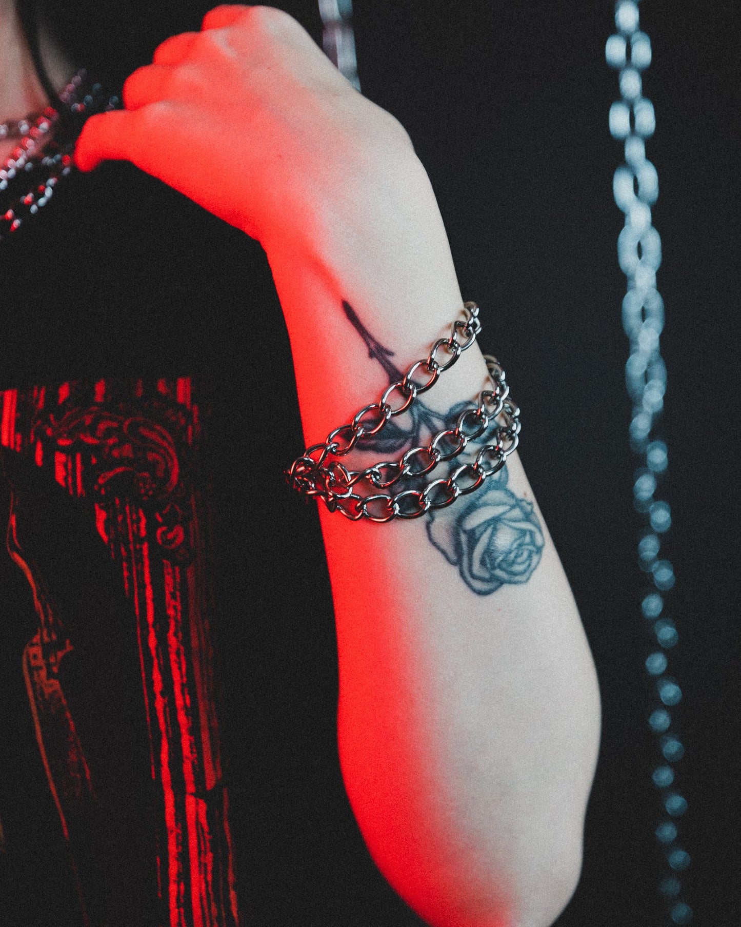 Evil Things silver tiered bracelet styled with rings