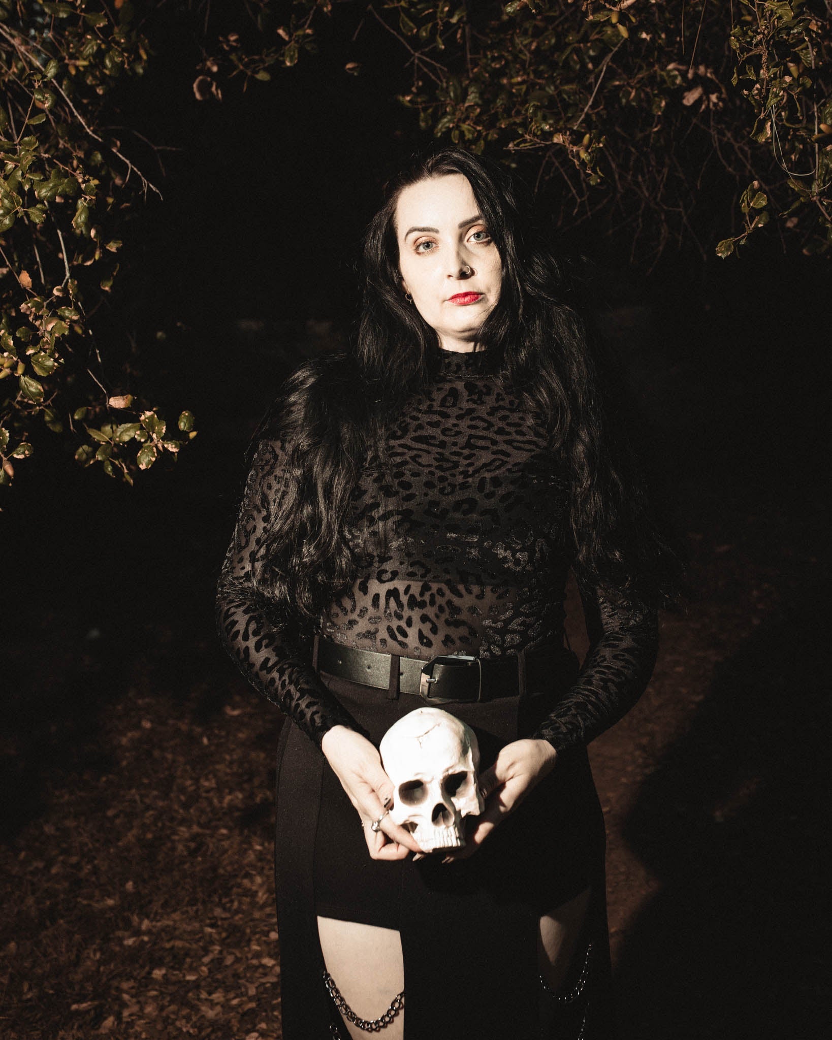 Black on black leopard burnout velvet top with a mock neck by The Pretty Cult
