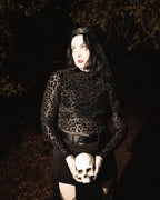 Sheer black burnout velvet texture on the Shadows top