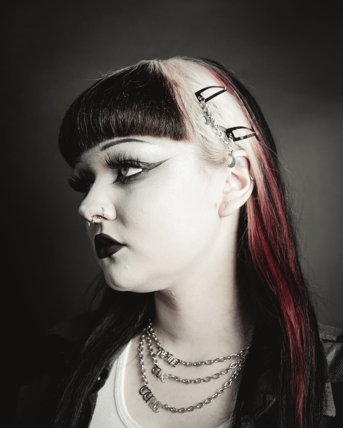 Set of four silver Double Moon hair clips laid flat, The Pretty Cult