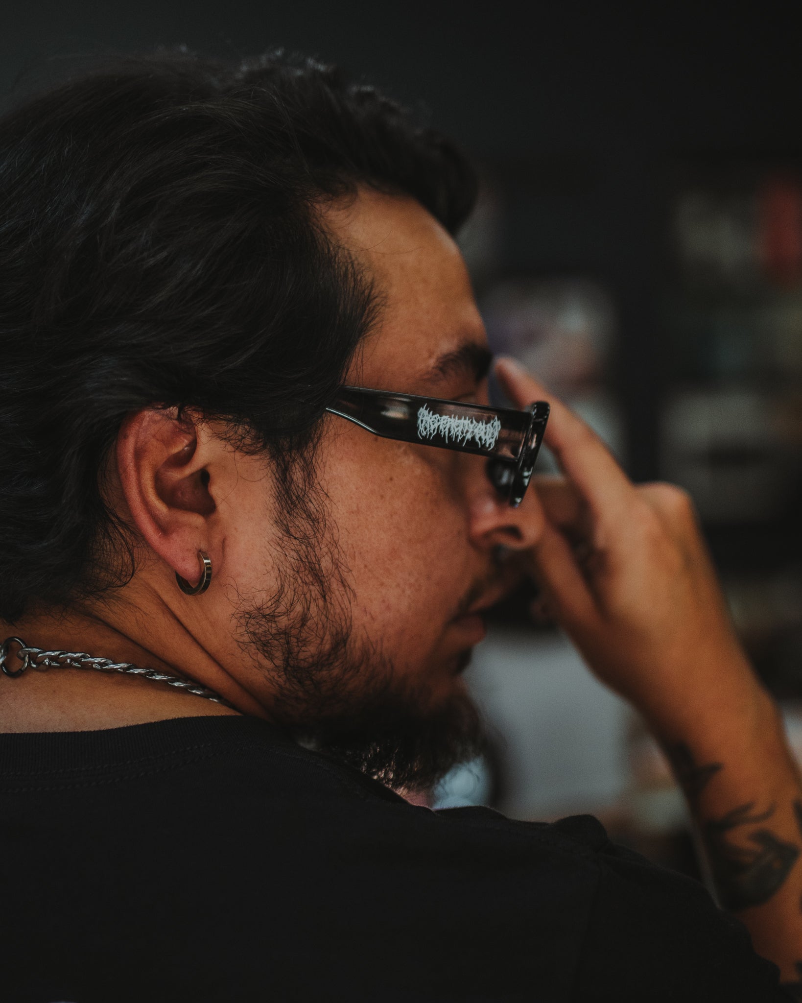 Black Metal sunglasses showing the slim black frame profile, The Pretty Cult