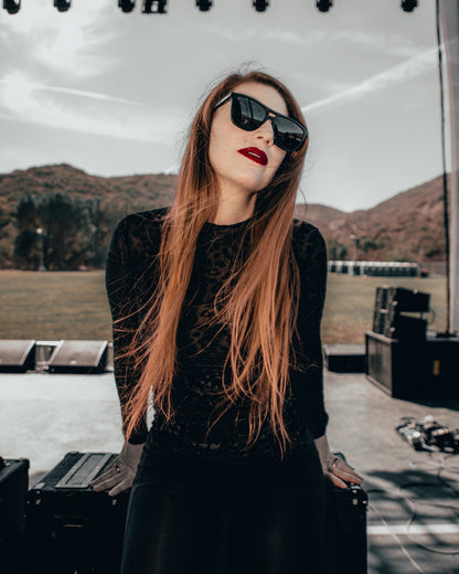 Black Shadows top styled with a wide belt