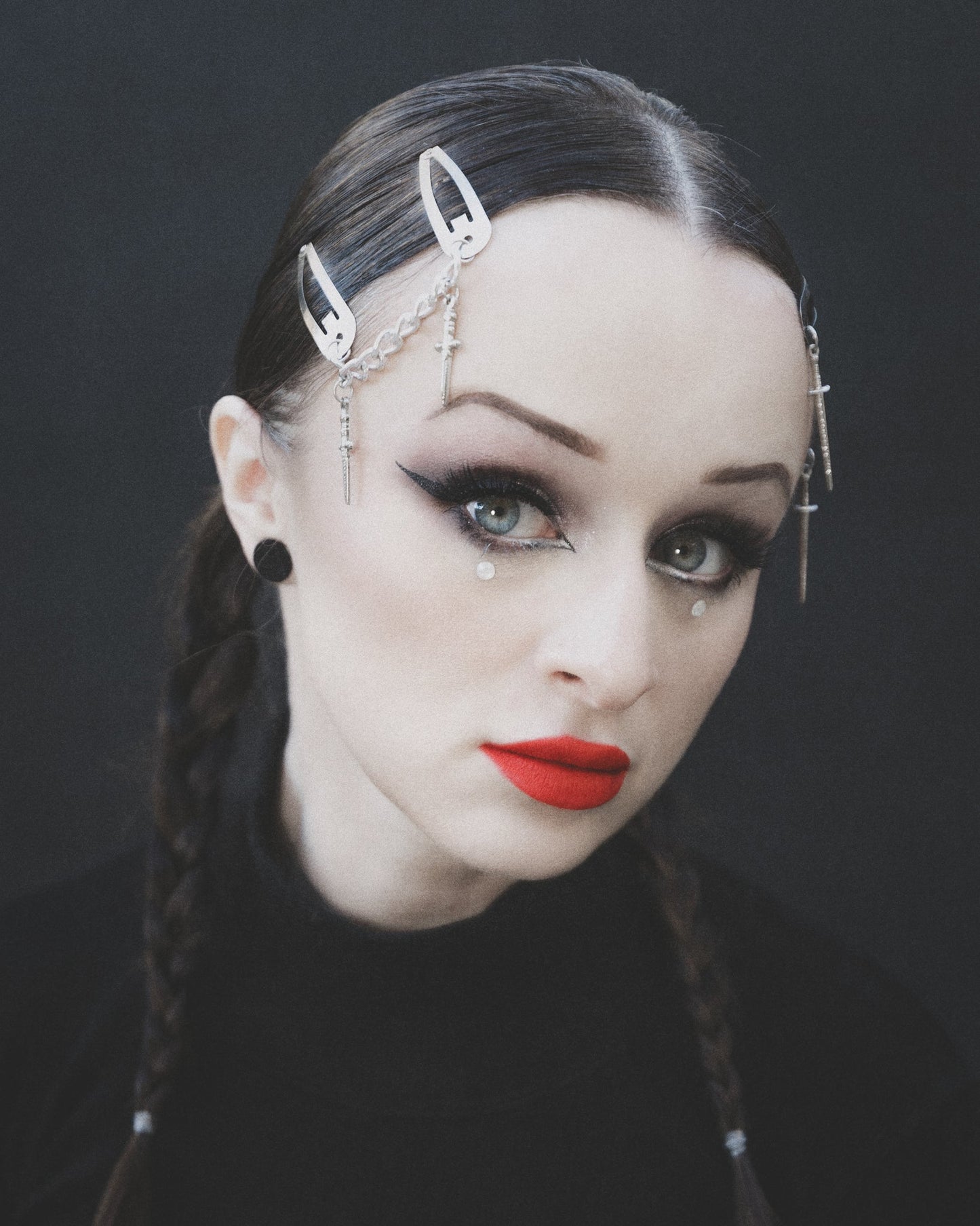 Model wearing the Sword silver hair clips with chain and athame charms, by The Pretty Cult