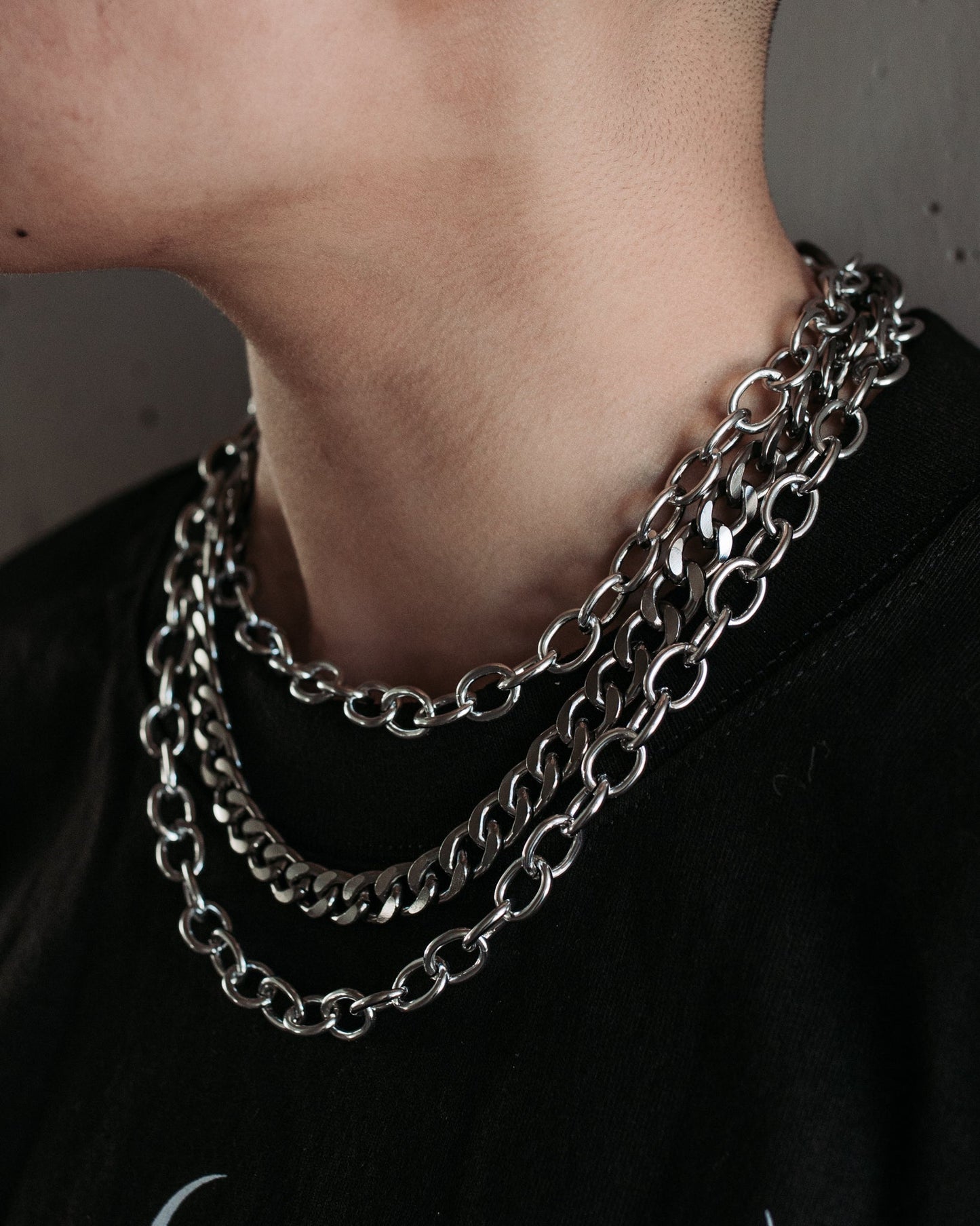 Covet silver layered chain necklace worn at the throat by The Pretty Cult