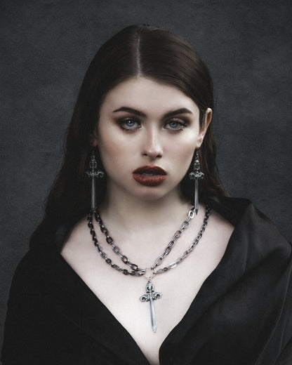 Woe Blade silver layered necklace styled on model