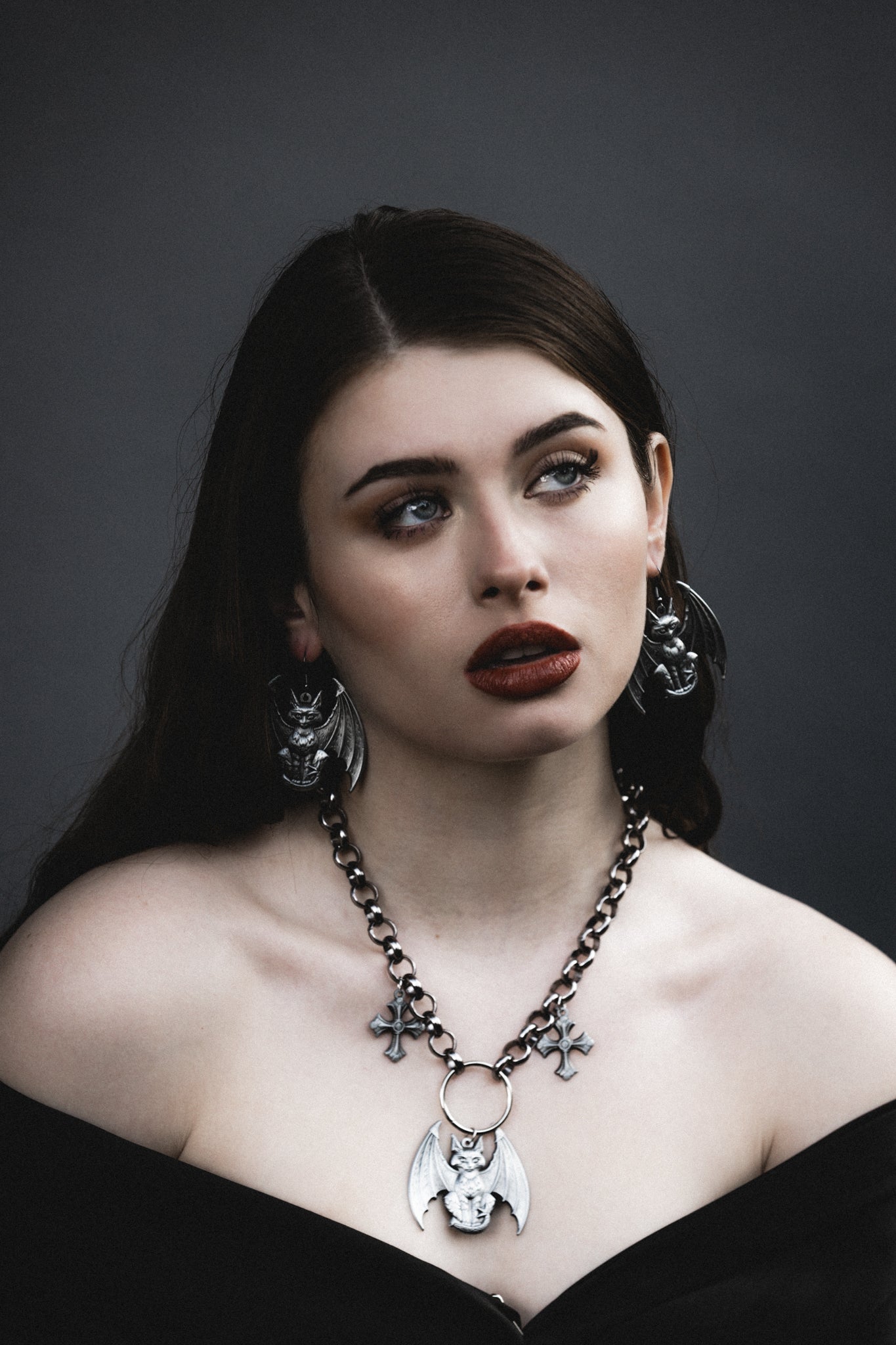 Model wearing the Lethal silver cat gargoyle necklace