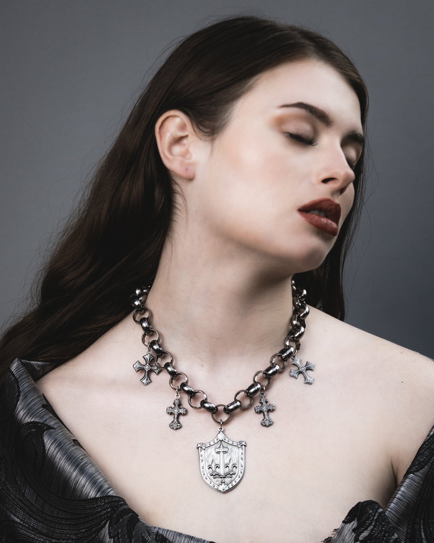 Le Fay silver shield statement necklace by The Pretty Cult