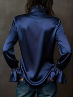 Champagne Belle flounce-sleeve blouse by Pinup Girl Clothing, sizes XS to 4X.