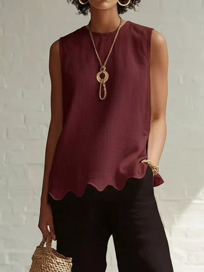Odile scalloped hem sleeveless blouse in wine red by Pinup Girl Clothing