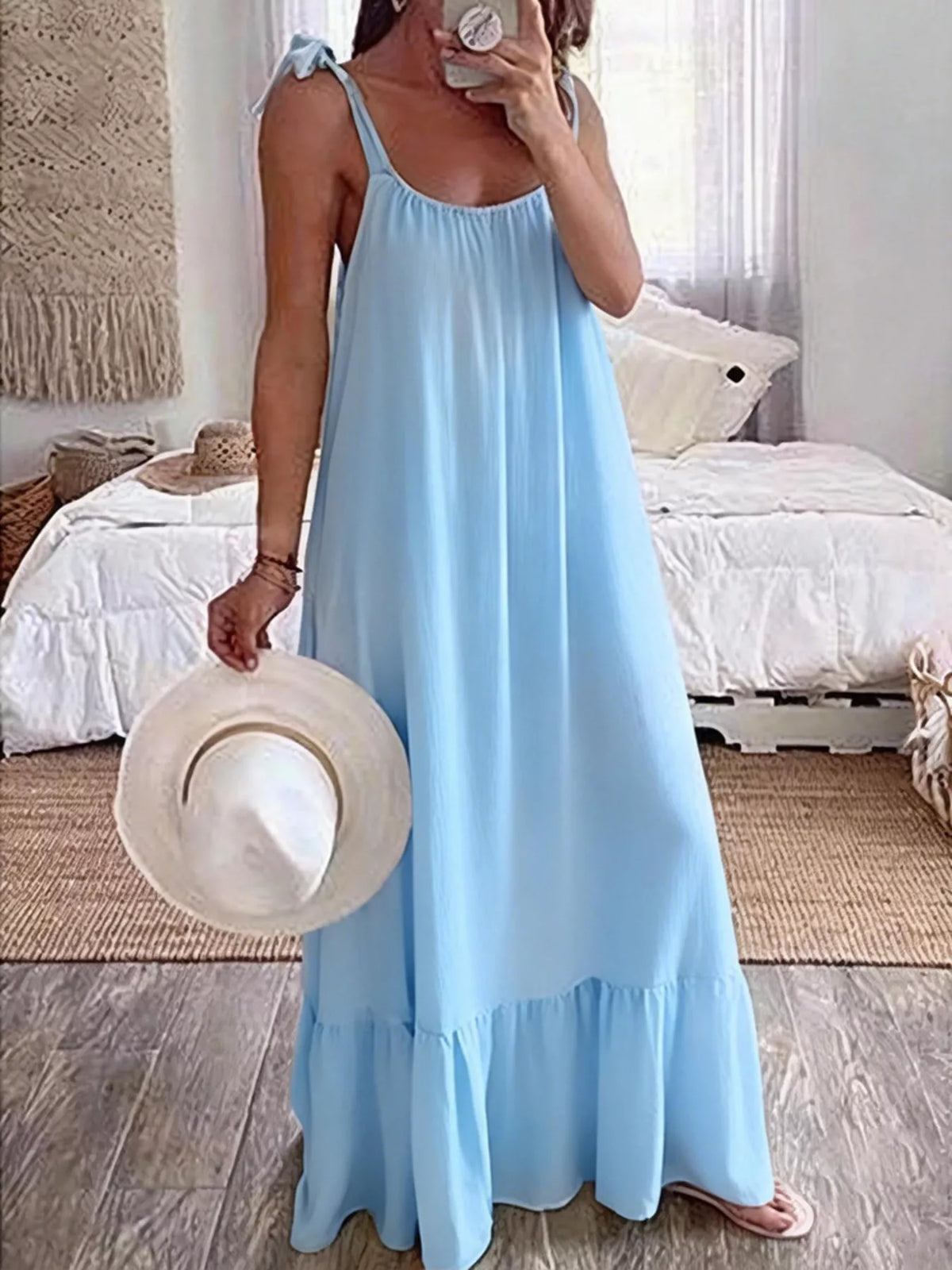 Tie-strap flowy maxi dress in sky blue by Pinup Girl Clothing.