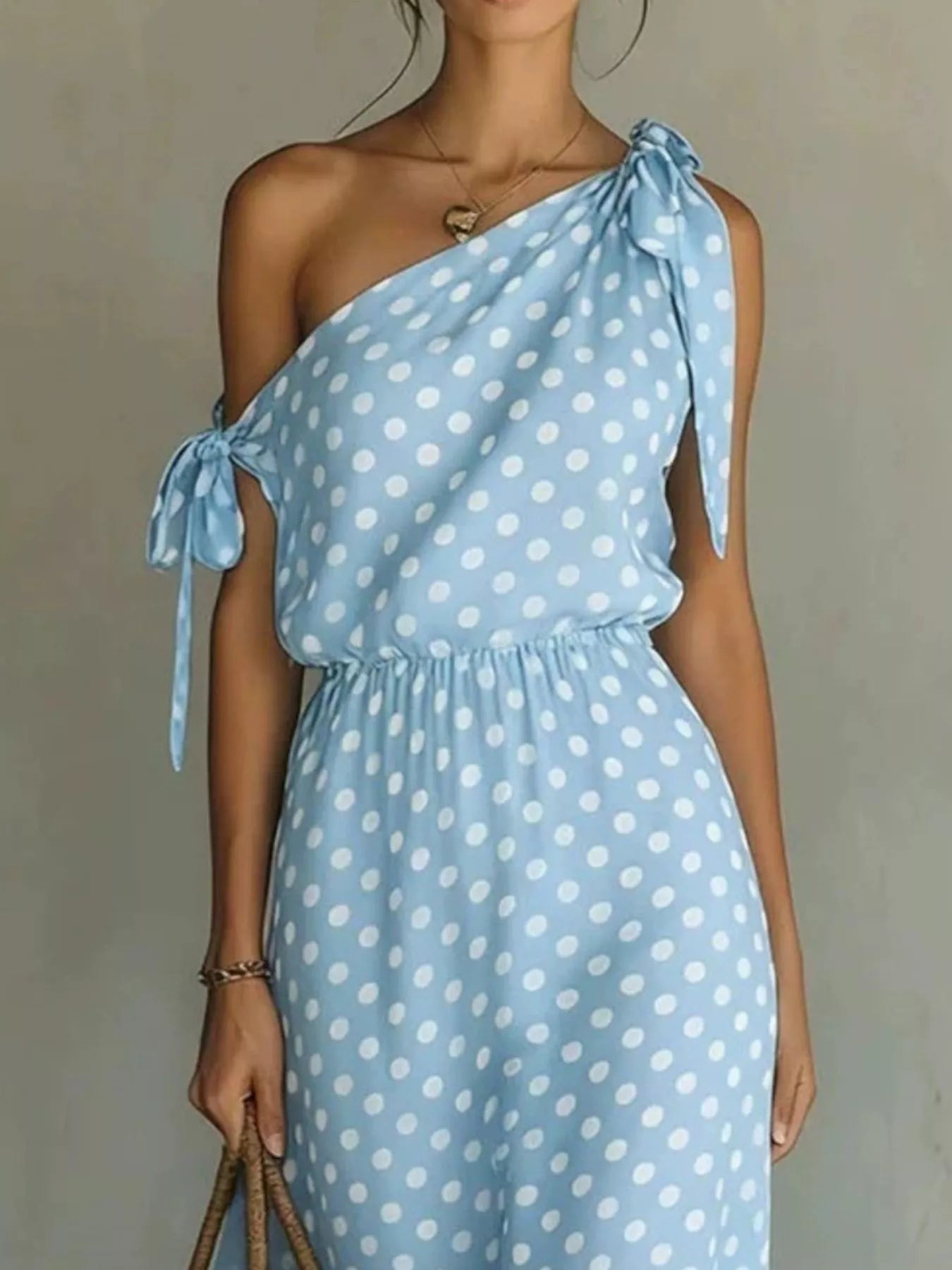 Dorothea polka dot midi dress shown from the back, by Pinup Girl Clothing