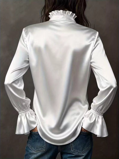 Vintage flounce-sleeve blouse in a romantic silhouette, by Pinup Girl Clothing, sizes XS to 4X.