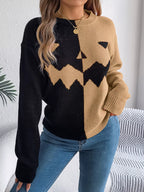 Carved two-tone pumpkin face sweater in black and camel