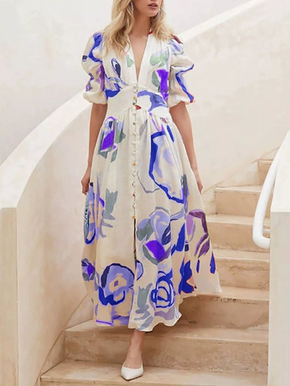 Genevieve painted print puff sleeve maxi dress in blue by Pinup Girl Clothing