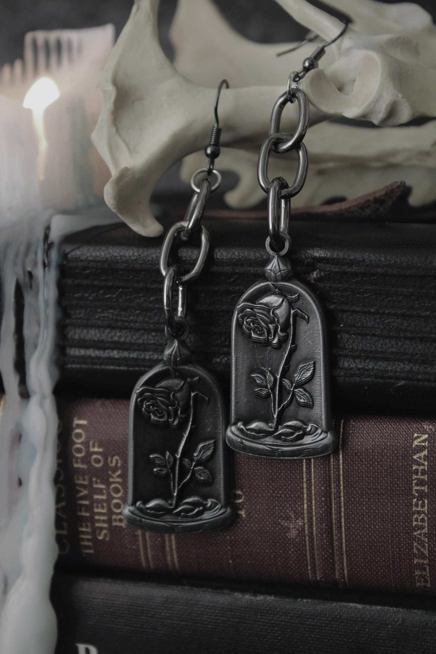 Dusted Rose blackened drop earrings styled against dark branches, The Pretty Cult