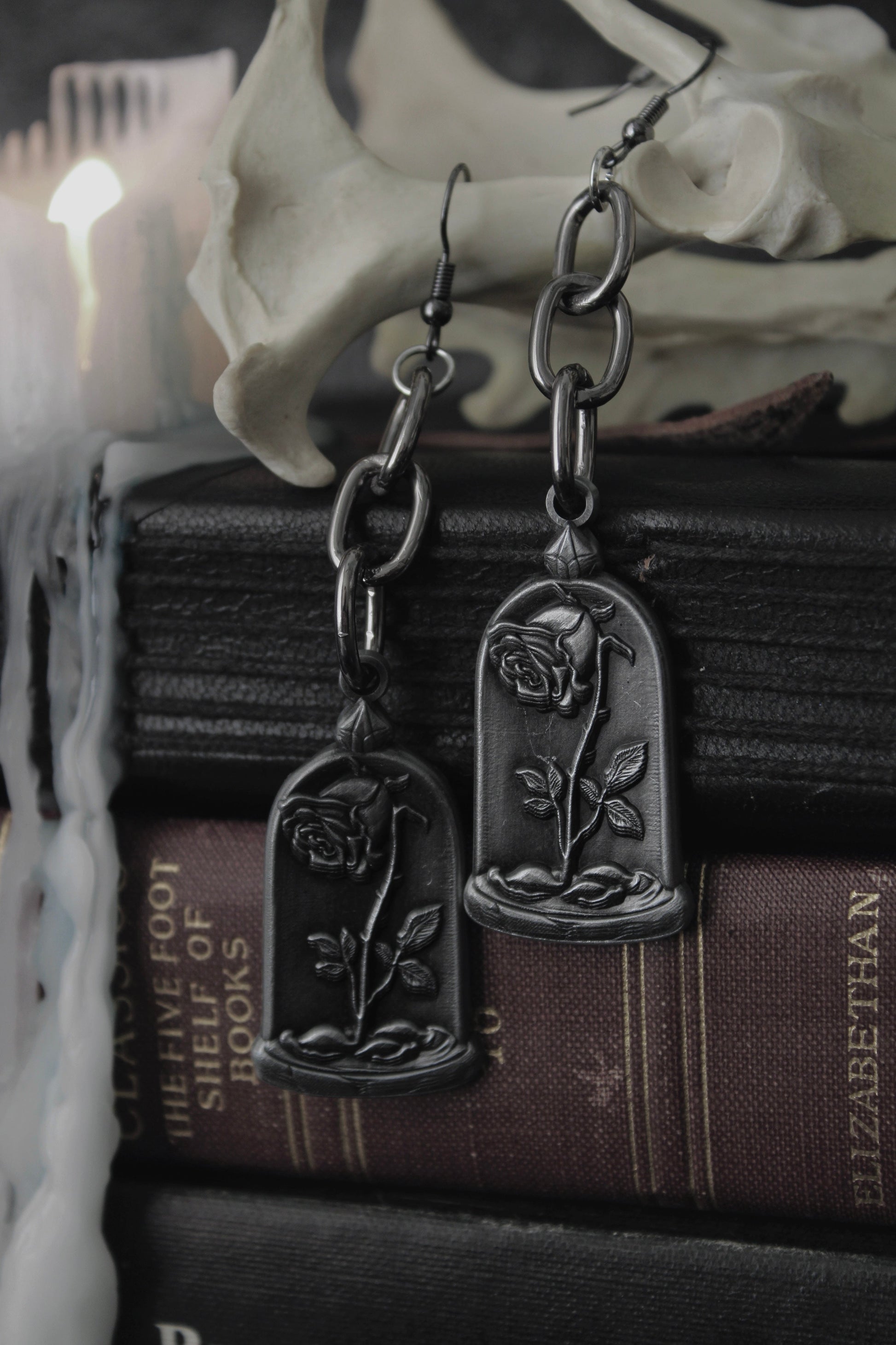 Dusted Rose blackened drop earrings styled against dark branches, The Pretty Cult