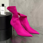 Siren pointed toe stretch sock boots in fuchsia, side view
