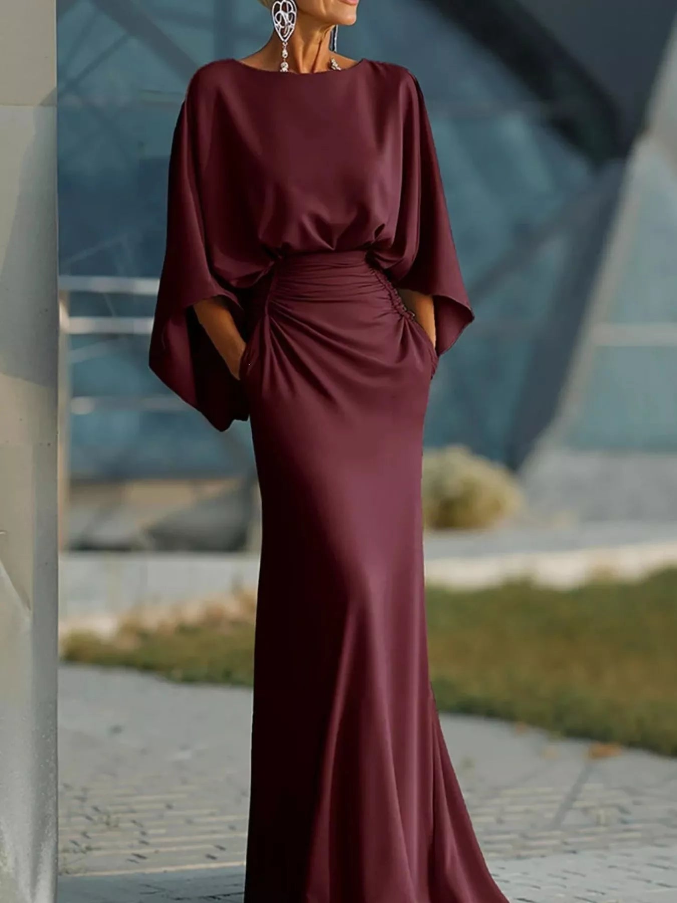 Batwing ruched maxi dress in red by Pinup Girl Clothing.
