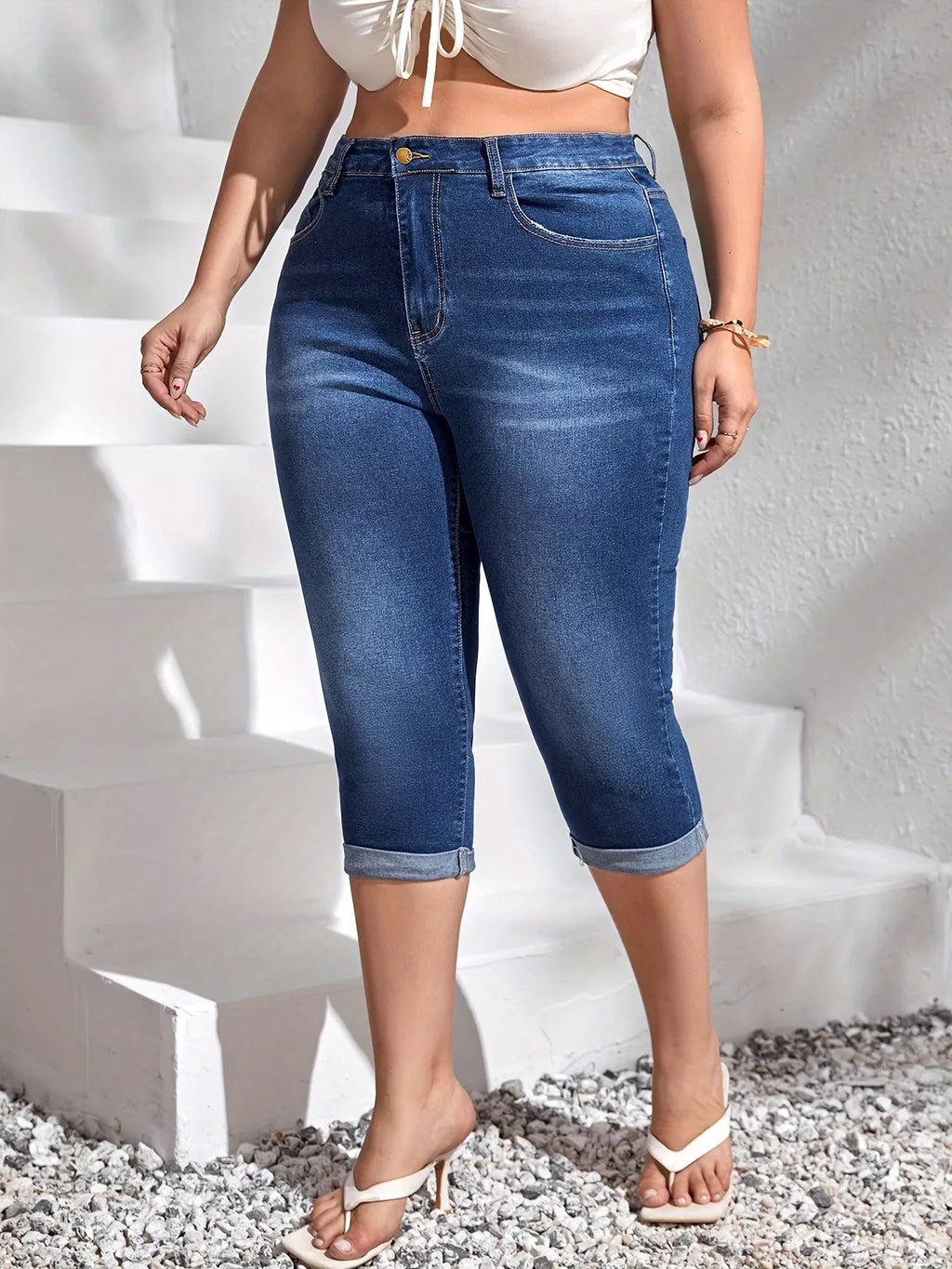 Marlowe rolled-hem high-waist denim capris in dark blue by Pinup Girl Clothing