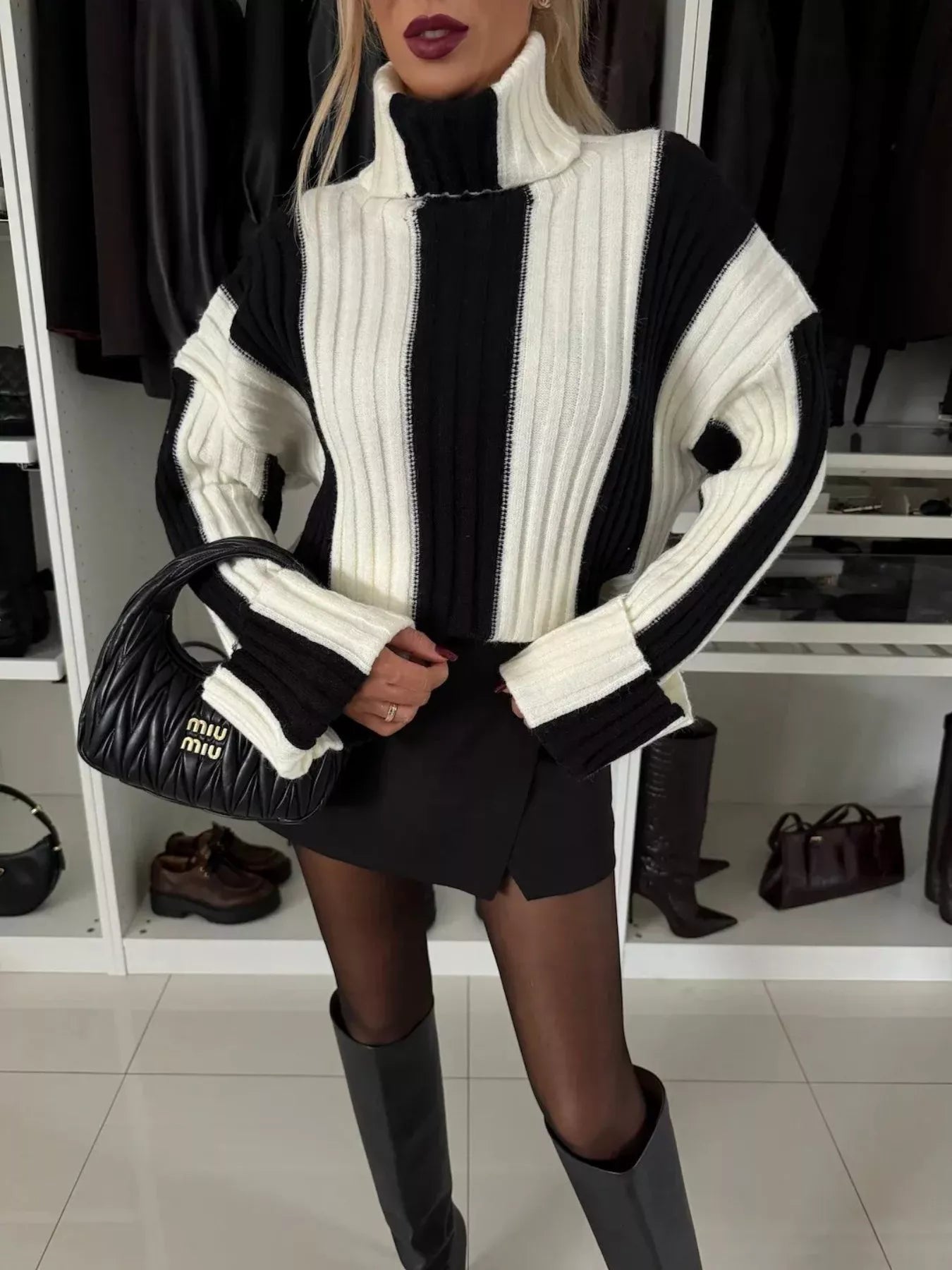 Bold stripe ribbed turtleneck sweater in black by Pinup Girl Clothing