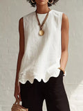 Odile scalloped hem sleeveless blouse in white by Pinup Girl Clothing