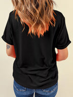 Nightmare Before Coffee tee in black, styled with high-waisted jeans
