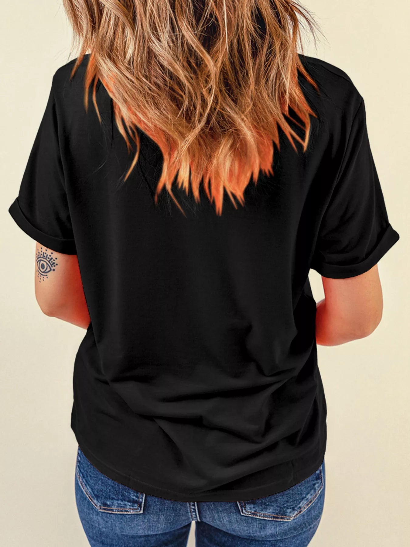 Nightmare Before Coffee tee in black, styled with high-waisted jeans