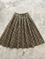 Doris pleated swing skirt in green plaid cotton by Pinup Girl Clothing