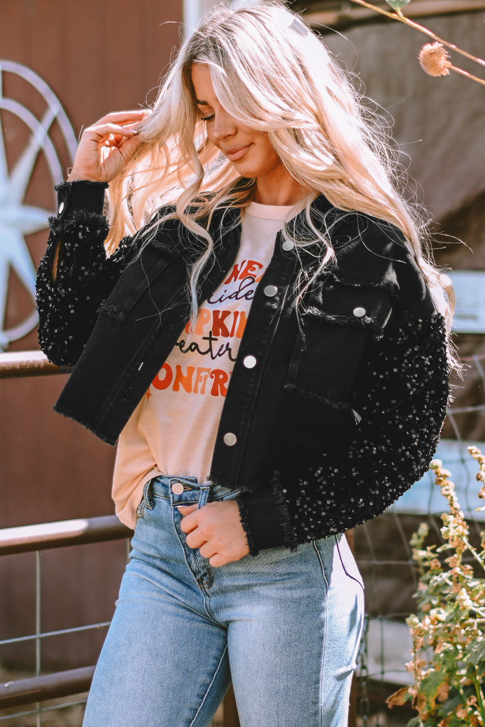 Rare Tour sequin sleeve denim jacket showing the raw hem
