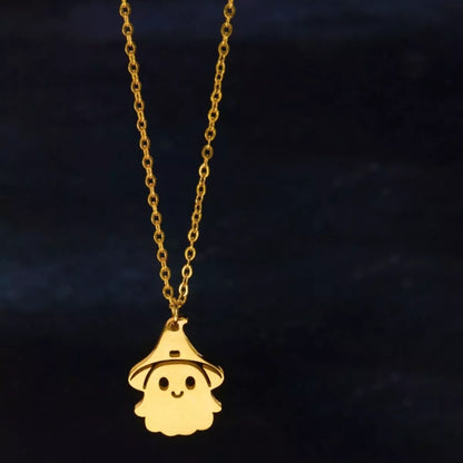 Gold ghost pendant necklace shown on the chain with extender