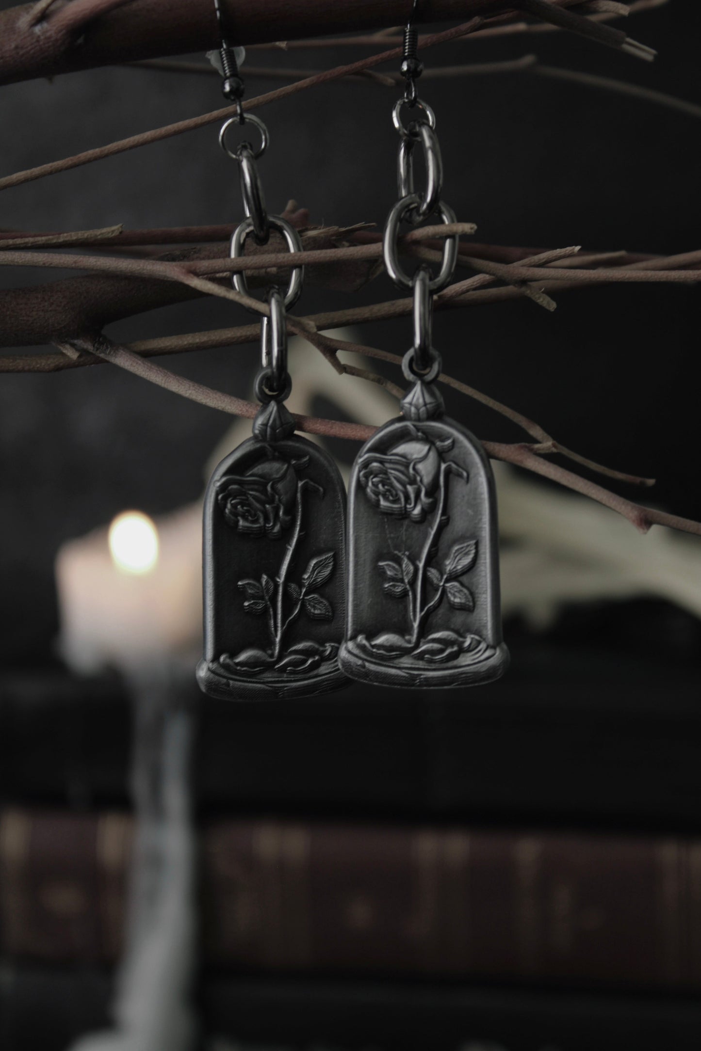 Close-up of the blackened rose pendant on the Dusted Rose earrings, The Pretty Cult