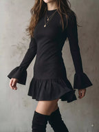 Ravenna bell sleeve ruffle hem mini dress in black three-quarter view